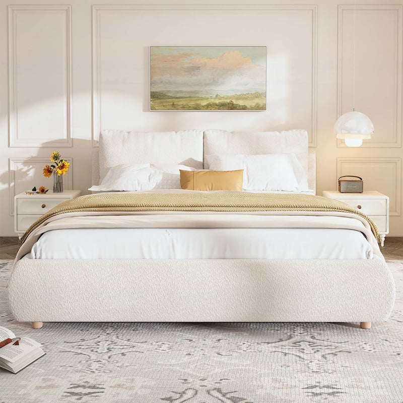 Luxurious Upholstered Platform Bed with Versatile Pillows and Graceful Headboard
