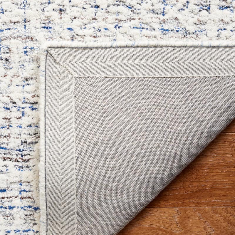 SAFAVIEH Handmade Ebony Pavlinka Modern Wool Rug