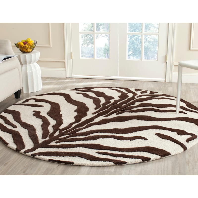 SAFAVIEH Handmade Cambridge Rikey Animal Print Wool Rug - 6' Round - Ivory/Brown