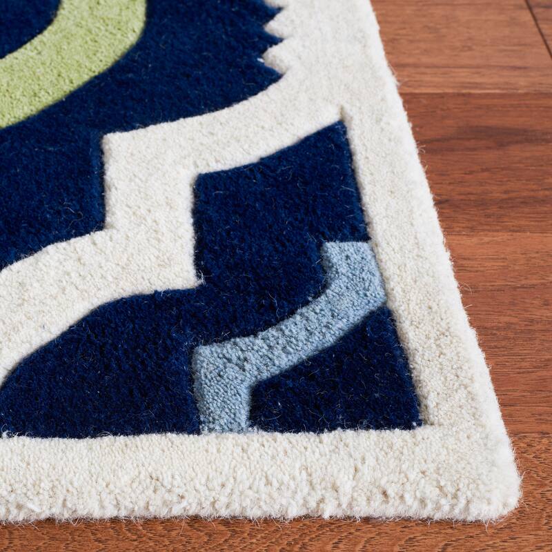 SAFAVIEH Handmade Chatham Vaka Modern Wool Rug