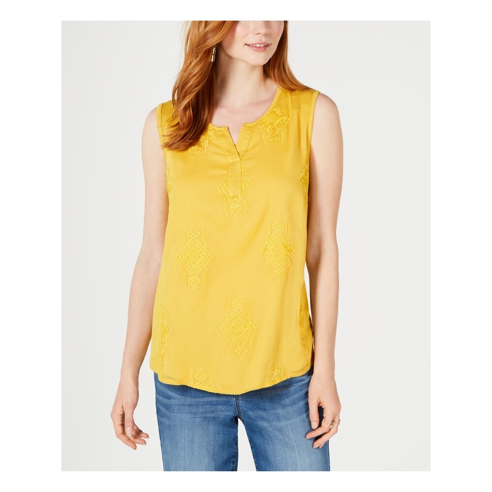 yellow sleeveless shirt