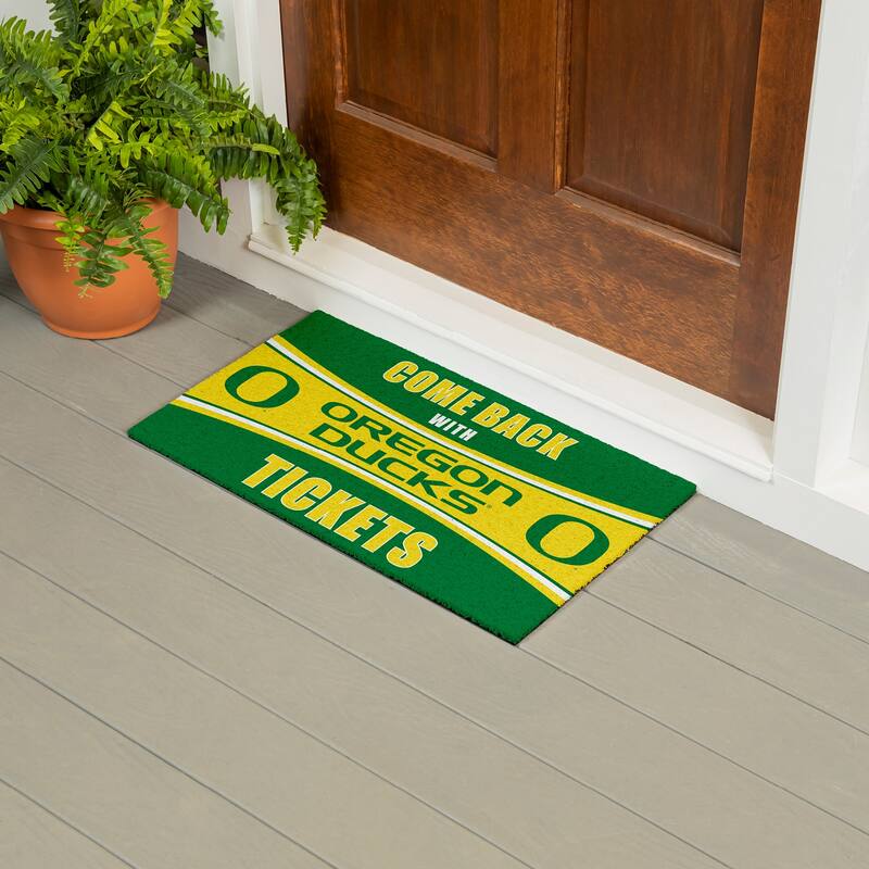 University of Oregon 28 in. x 16 in. PVC "Come Back With Tickets" Trapper Door Mat
