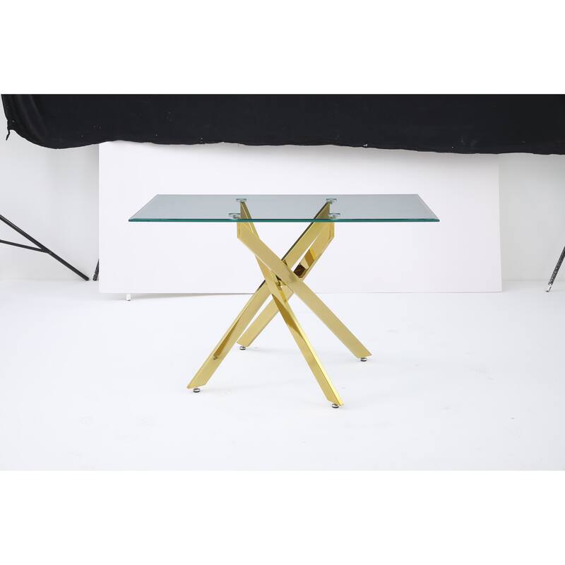 The modern rectangular tempered glass tabletop is paired with a golden iron frame, measuring 47.24 inches in length