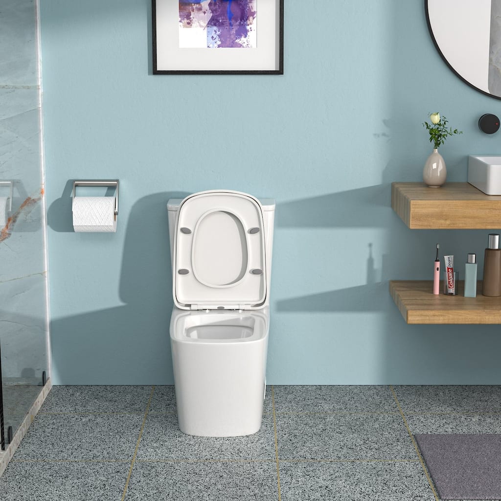 1-piece 1.6 GPF Dual Flush Elongated Toilet in White Seat Included - 27" x 14" x 30"