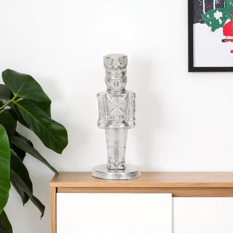 HomeRoots 7" Silver Cast Iron Christmas Nutcracker Figurine - 2.75 in. x 7.00 in. x 2.75 in. - 2.75 in. x 7.00 in.  x 2.75 in.