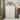 White Vertical Dresser Drawer Chest: Six Spacious Drawers with Black Pulls, Ideal for Bedroom Organization