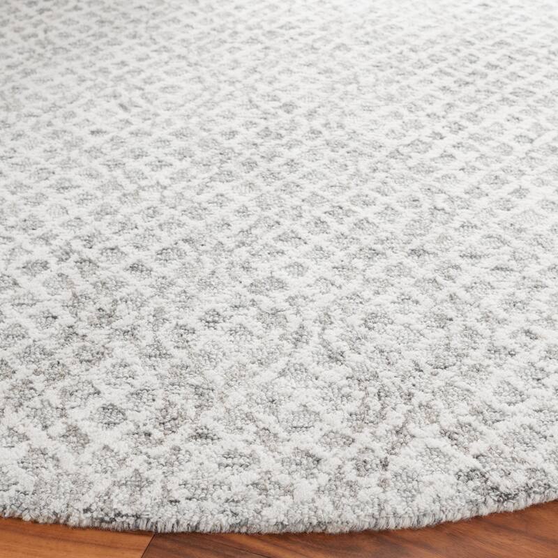 SAFAVIEH, Handmade Ebony Juozapa Modern Wool Rug