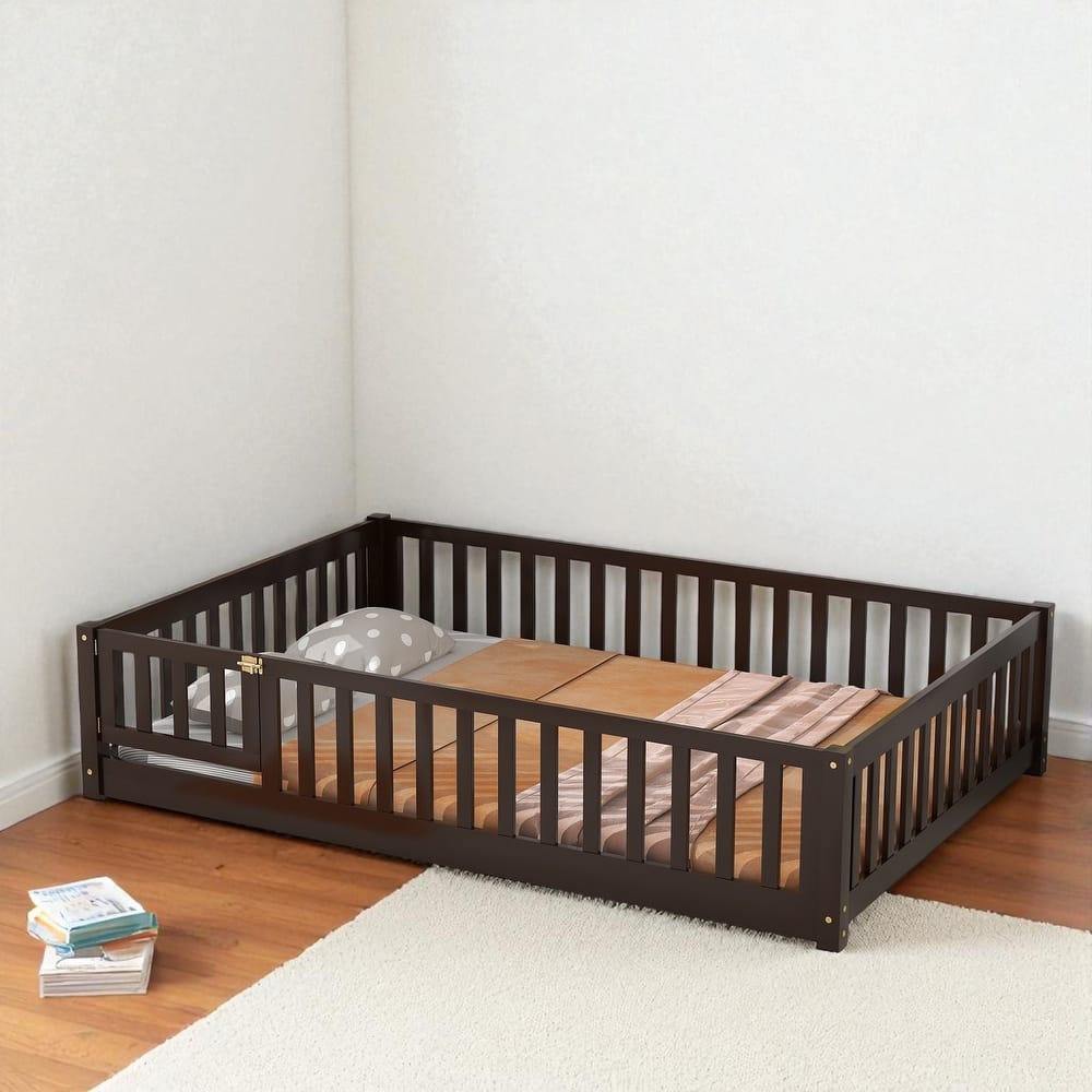 Full Size Rubber Wood Floor Bed with Fence, Door and Safety Guardrails for Kids