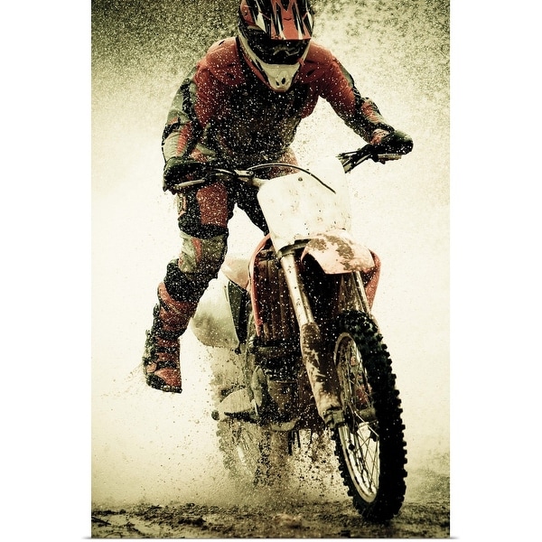 "Dirt bike rider splashes through water filled stream" Poster Print
