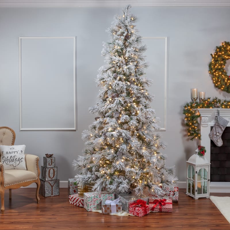 9 Foot Pre Lit Lightly Flocked Snowbell Pine with 900 Twinkling Lights - N/A