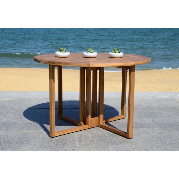 slide 2 of 9, SAFAVIEH Wales Round 47.24-Inch Dia Dining Table - 47.3"x47.3"x29.5" - 47.3" W x 47.3" D x 29.5" H Natural