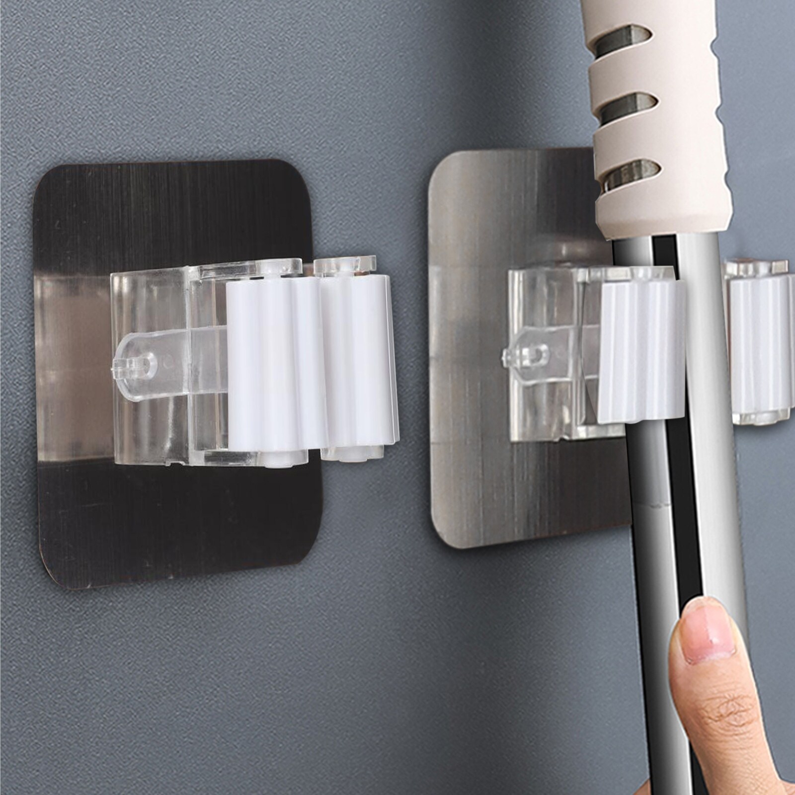 https://ak1.ostkcdn.com/images/products/is/images/direct/69ca7d32f345ffb48429ad0206265e330dd793d0/Wall-Mounted-Mop-Organizer-Holder-Brush-Broom-Hanger-Storage-Rack-Kitchen-Tool.jpg