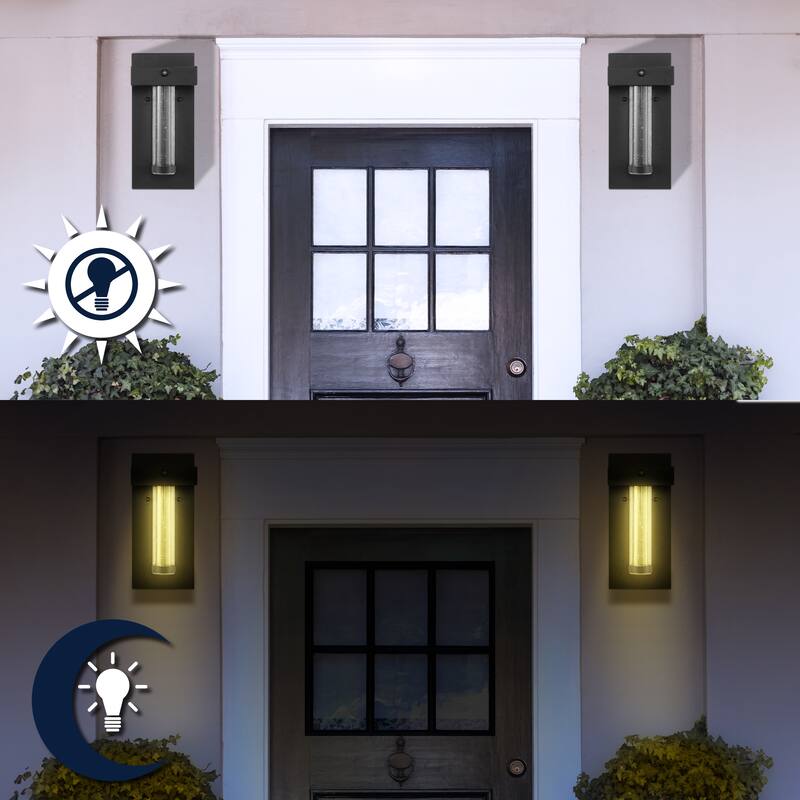 Juno 5.5" 1-Light Minimalist Iron/Seeded Glass with Dusk-to-Dawn Sensor Integrated LED Outdoor Sconce, Black by JONATHAN Y - 5.5