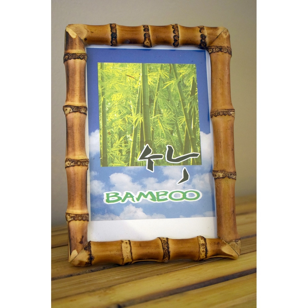 https://ak1.ostkcdn.com/images/products/is/images/direct/69f929955bcba866fdab86e38243daf5c09ea429/Handmade-Bamboo-Root-Frame-%28Vietnam%29.jpg
