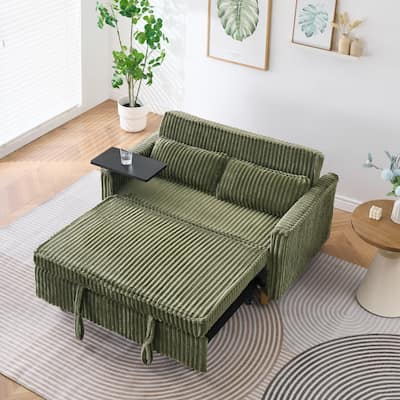 The pull-out and push-in green corduroy sofa with dual functions,equipped with a movable tabletop and USB ports