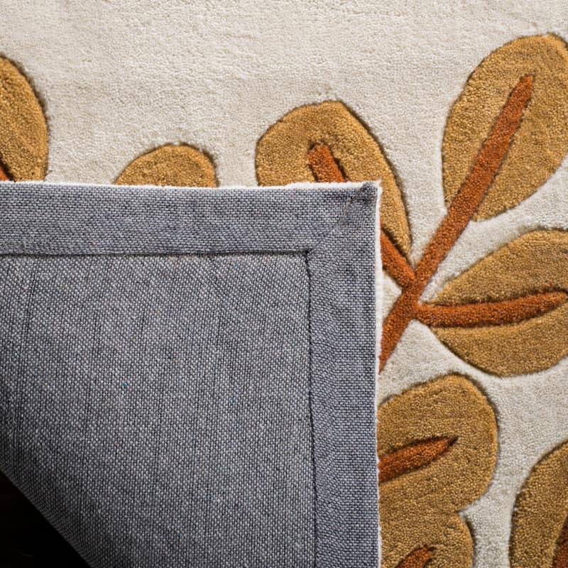 SAFAVIEH Handmade Modern Art Cvetana Modern Polyester Rug