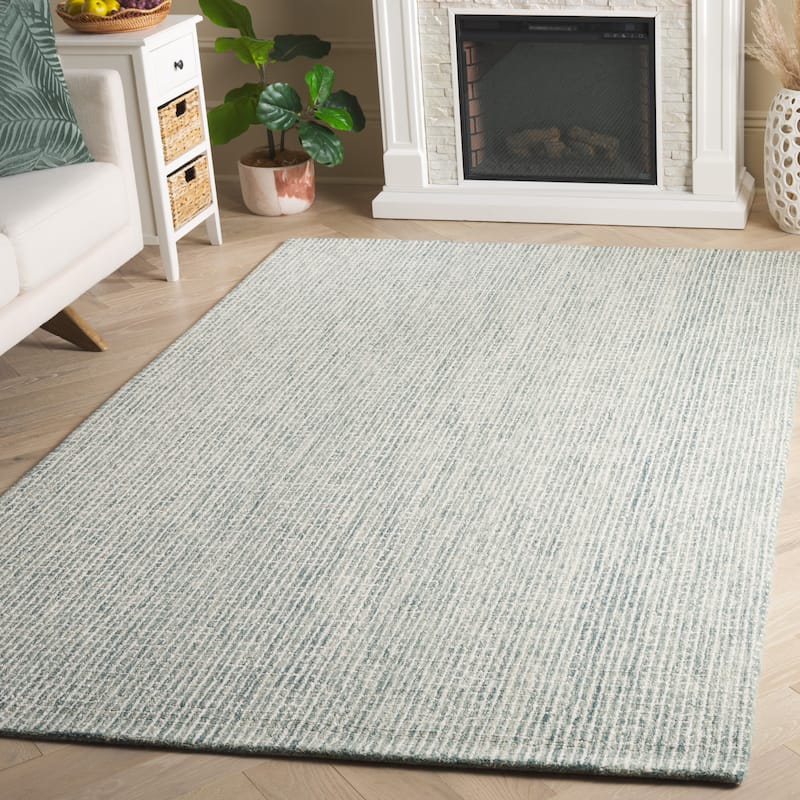 SAFAVIEH Handmade Ebony Herfriede Modern & Contemporary Wool Rug - 5' x 8' - Green/Ivory