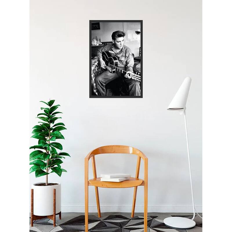 Elvis in Army with Guitar Black & White Framed Poster - 24 x 36 Inch