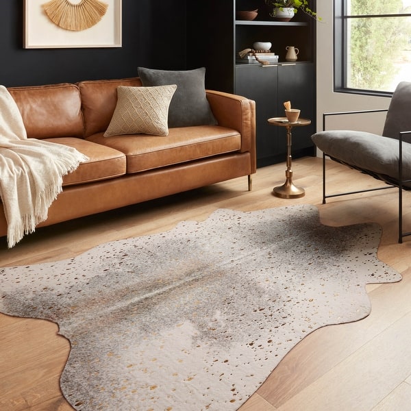 https://ak1.ostkcdn.com/images/products/is/images/direct/6a794435bf3eaf3a4ffbab92a4f1a89dce050409/Clayton-Modern-Rustic-Faux-Cowhide-Area-Rug.jpg?impolicy=medium
