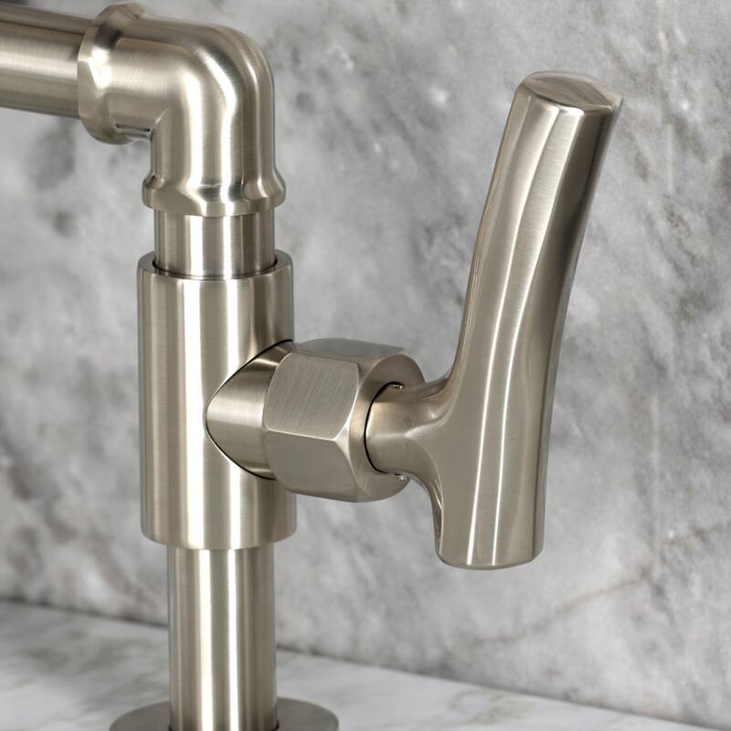 Kingston Brass Hallerbos Two-Handle 4-Hole Deck Mount Bridge Bathroom Faucet with Brass Pop-Up Drain