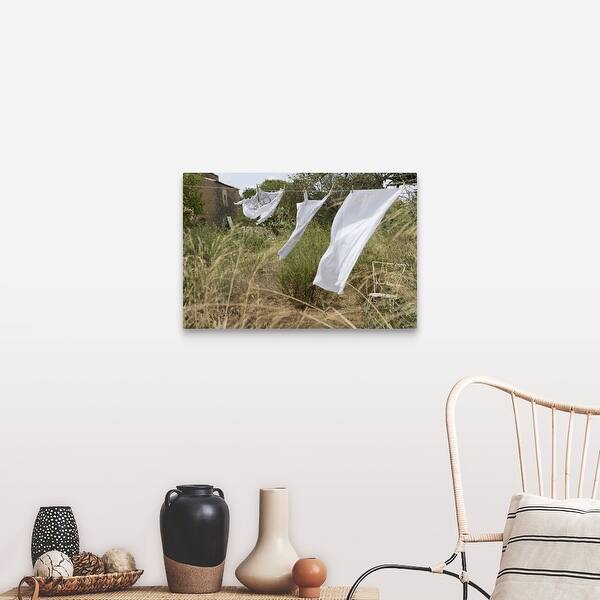 Shop Clothes And Sheet On Clothesline Canvas Wall Art