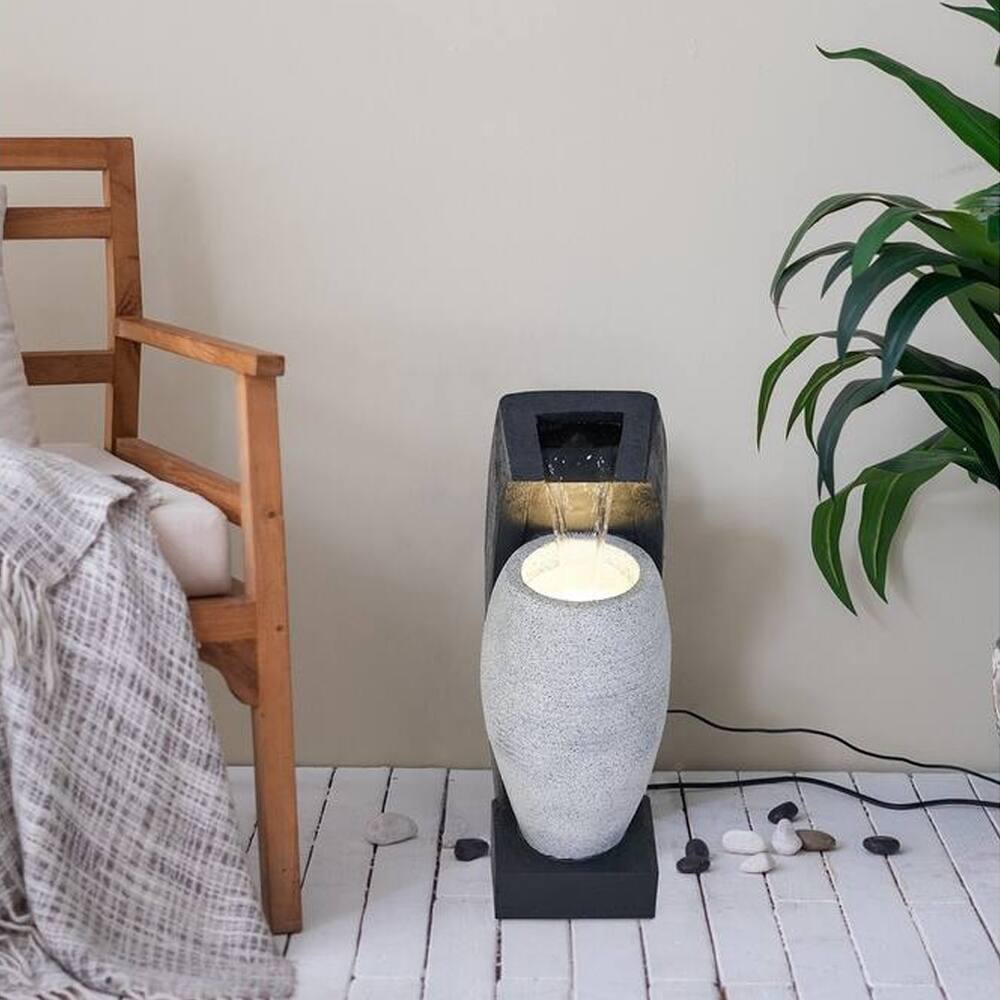 Black and White Water Fountain with Vase Design