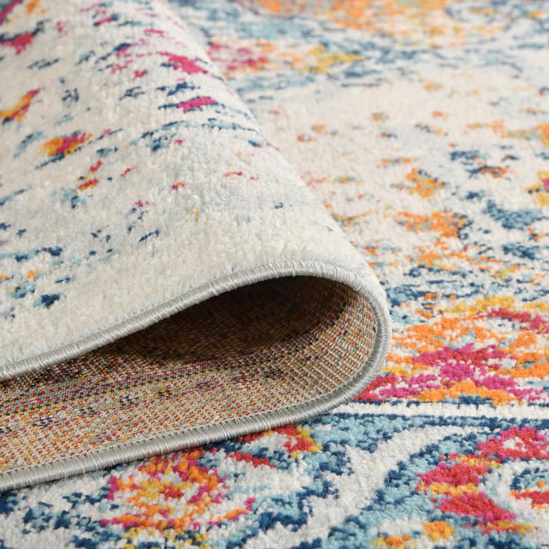 Aurelia Mata Orange Bordered Area Rug