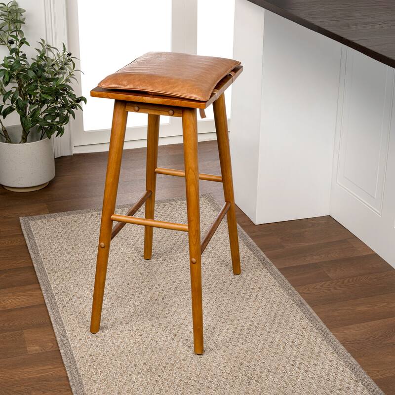 Saddle-Seat Solid Wood/Vegan Leather Backless Stool with Removeable Cushion, By JONATHAN Y - Bar Height - Chestnut Brown