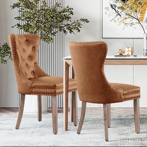 Upholstered buttoned deals dining chairs