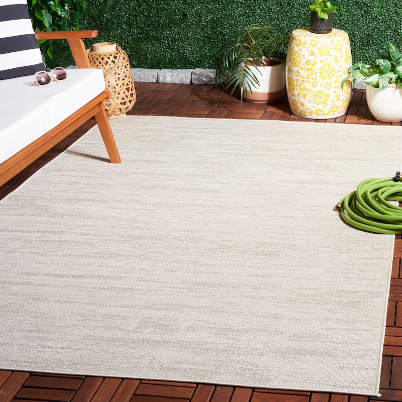 SAFAVIEH Lakeside Arianwen Indoor/Outdoor Waterproof Patio Backyard Rug - 4' x 5'7" - Beige