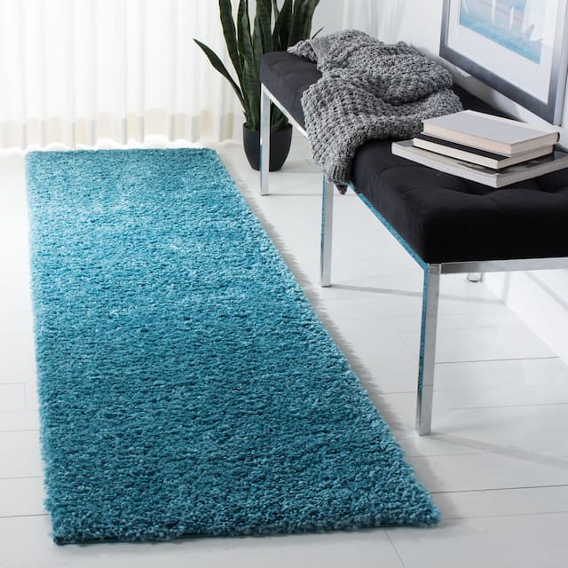 SAFAVIEH August Shag Solid 1.2-inch Thick Area Rug - 2'3" x 10' Runner - Turquoise