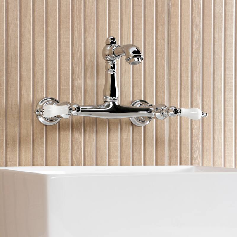 Kingston Brass English Country Two-Handle 2-Hole Wall Mount Bathroom Faucet