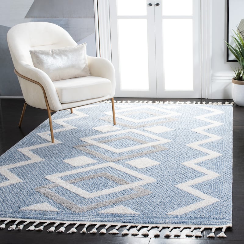 SAFAVIEH Moroccan Tassel Shag Portia Tribal 0.75-inch Thick Rug - 5'5" x 7'7" - Ivory/Light Blue