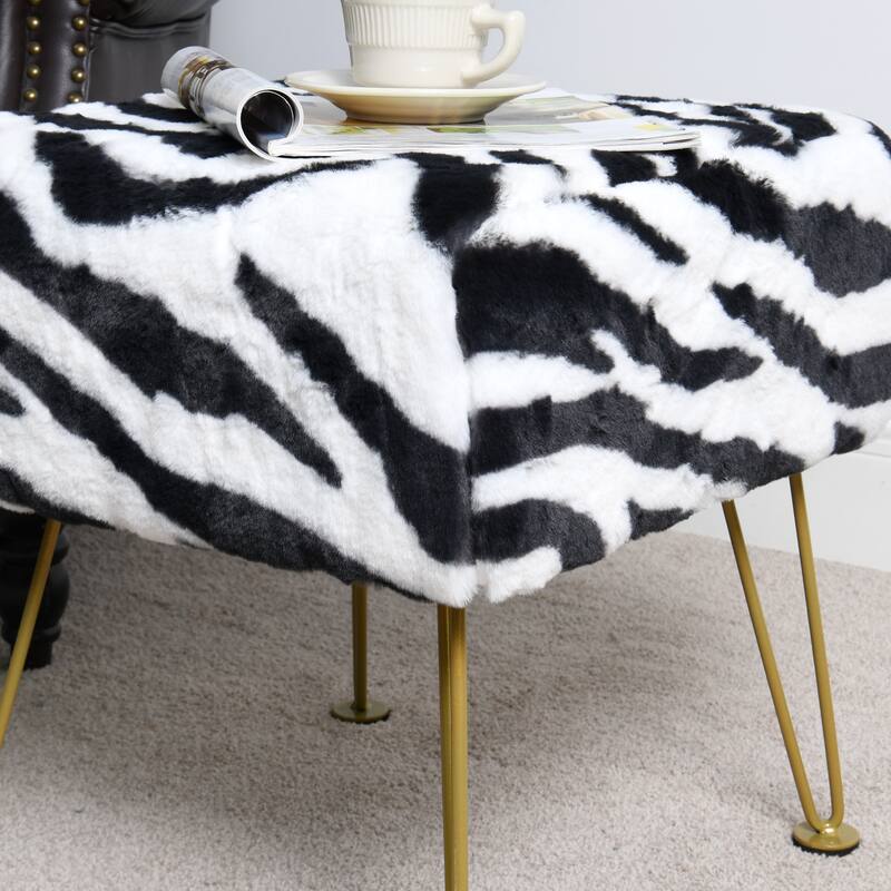 Home Soft Things Zebra Fauxfur Ottoman with Gold Metal Legs.