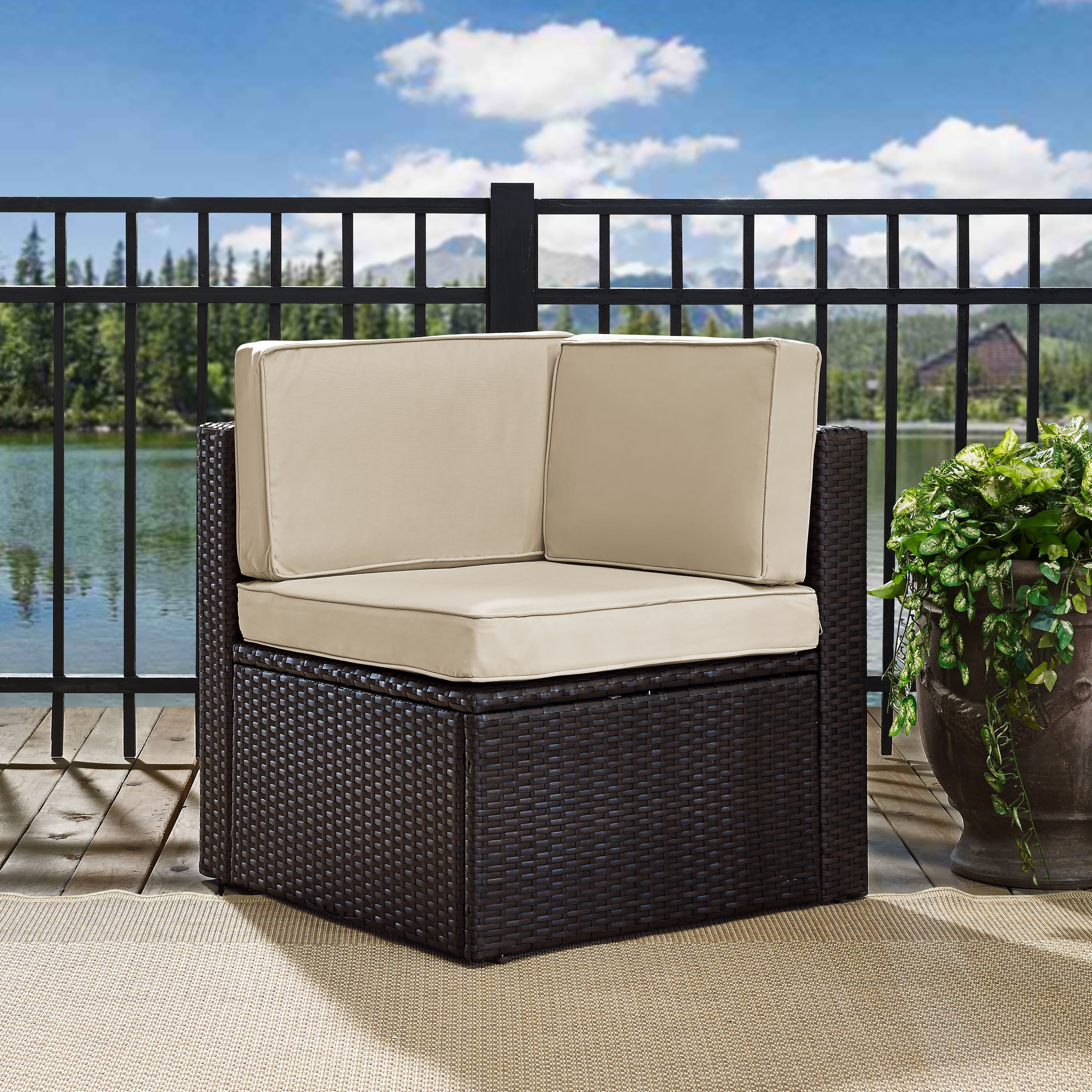 Palm Harbor Outdoor Wicker Corner Chair in Brown with Sand