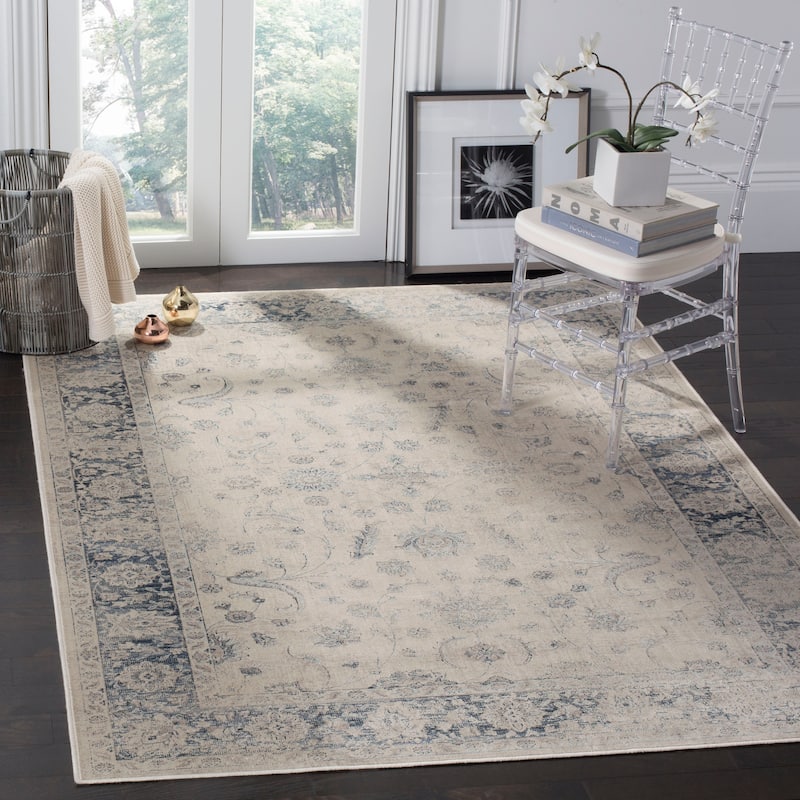 SAFAVIEH Vintage Elise Oriental Distressed Viscose Rug - 6'7" x 9'2" - Stone/Blue