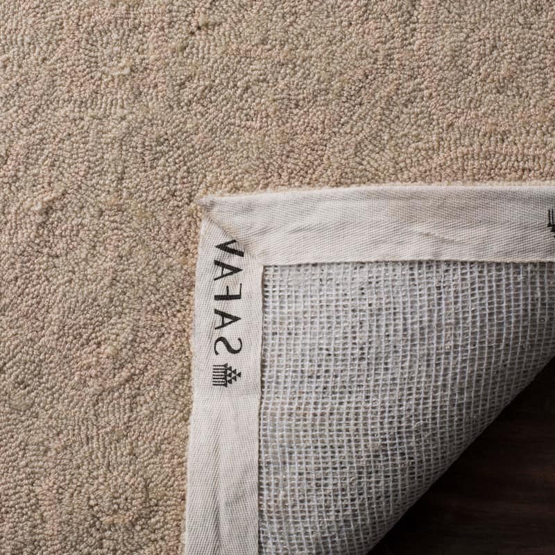 SAFAVIEH Handmade Easy Care Vaxhide Oriental Rug