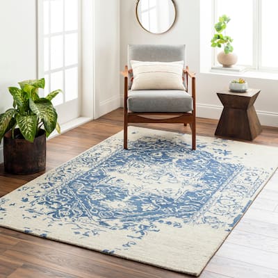 Felecia Handmade Distressed Medallion Wool Area Rug
