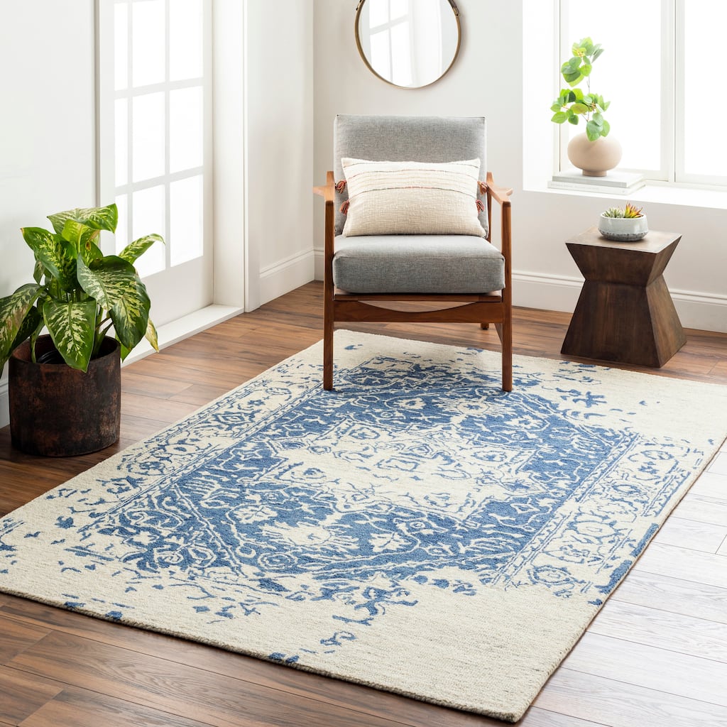 Felecia Handmade Distressed Medallion Wool Area Rug