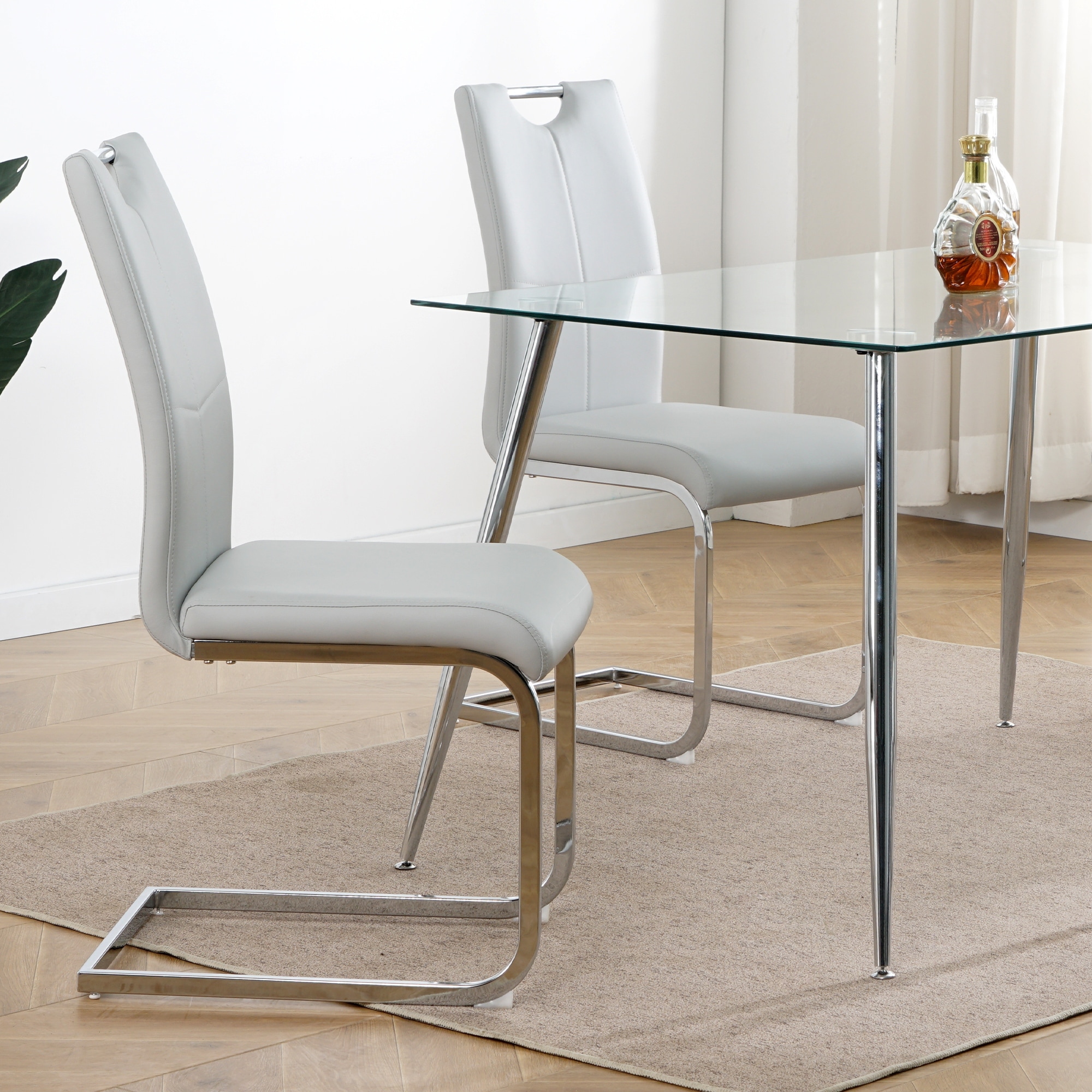 Modern Dining Chairs with Faux Leather Padded Seat and Metal Legs