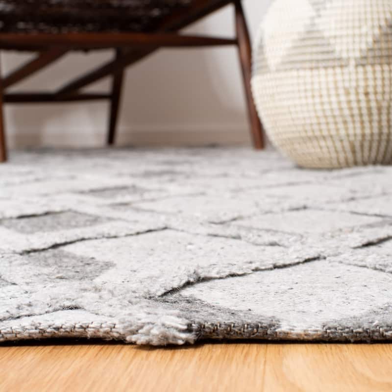 SAFAVIEH Handmade Marbella Sevastia Modern Polyester Rug