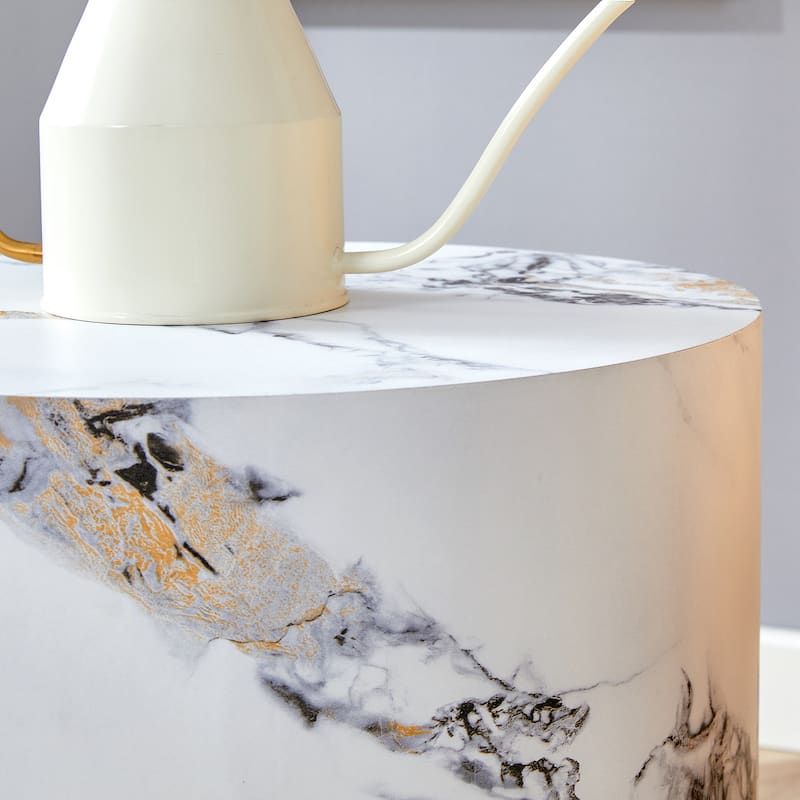 The cylindrical table with its patterned design can be easily integrated into a variety of interior styles, small dining tables