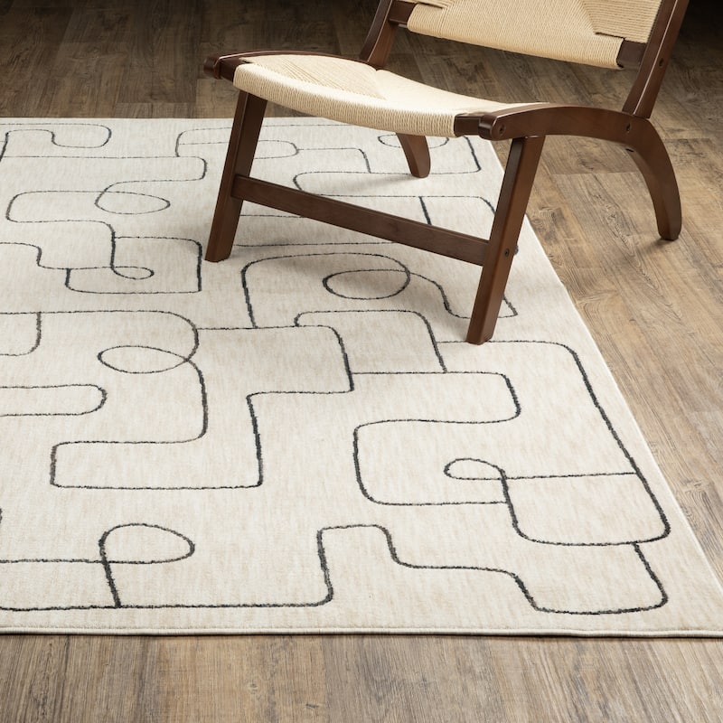 Hansel Abstract Lines Beige/ Black Area Rug - 6'7" x 9'6"