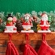 preview thumbnail 13 of 33, Glitzhome Resin Santa Snowman Penguin Gnomes with JOY Christmas Stocking Holders Mantel Ornament(Set of 3)