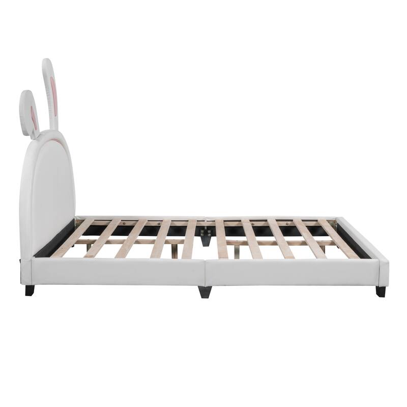 Upholstered faux leather platform bed