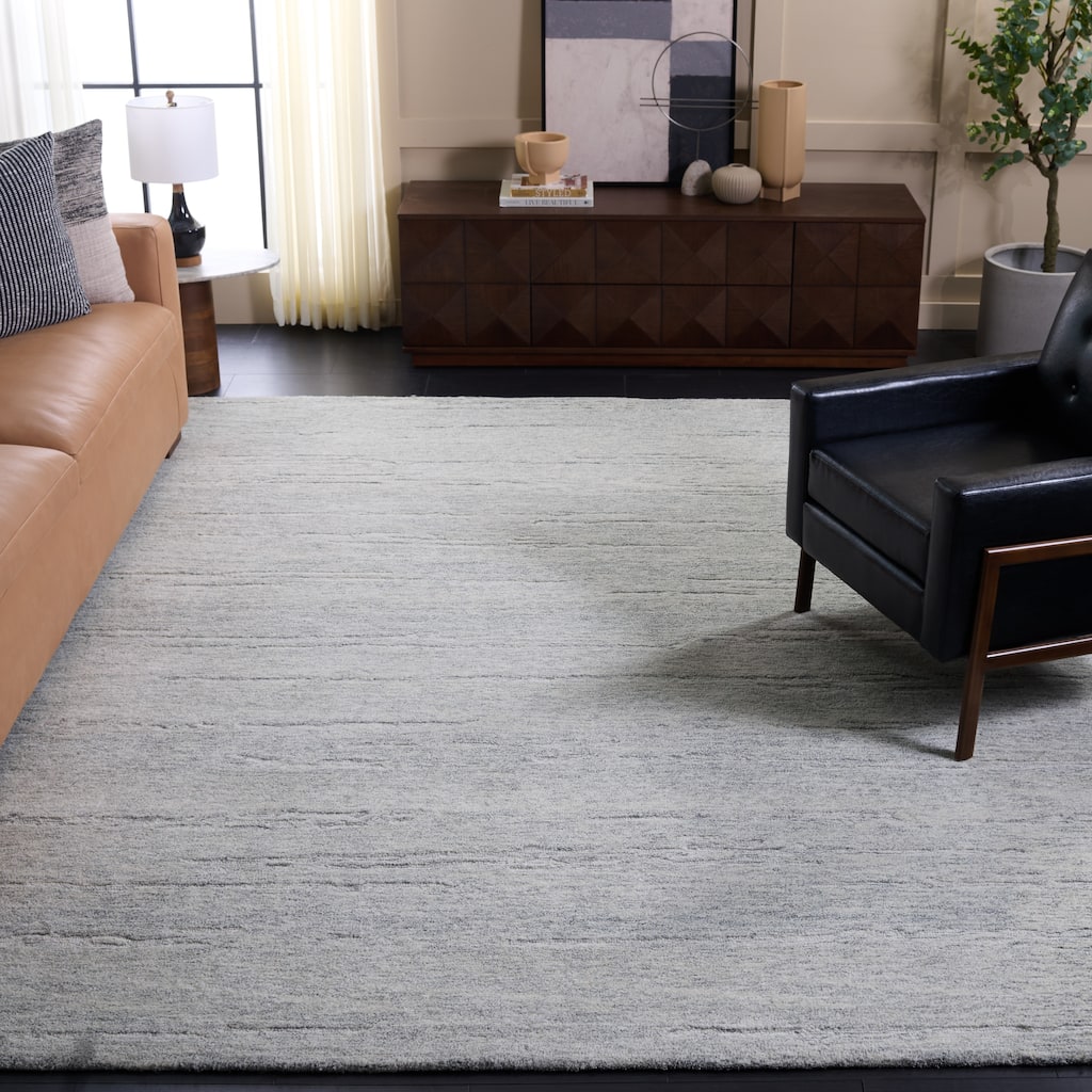 SAFAVIEH Handmade Ebony Alheide Wool Rug
