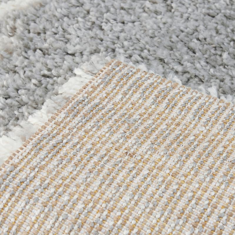 Hughes Geometric Striped Shag Area Rug