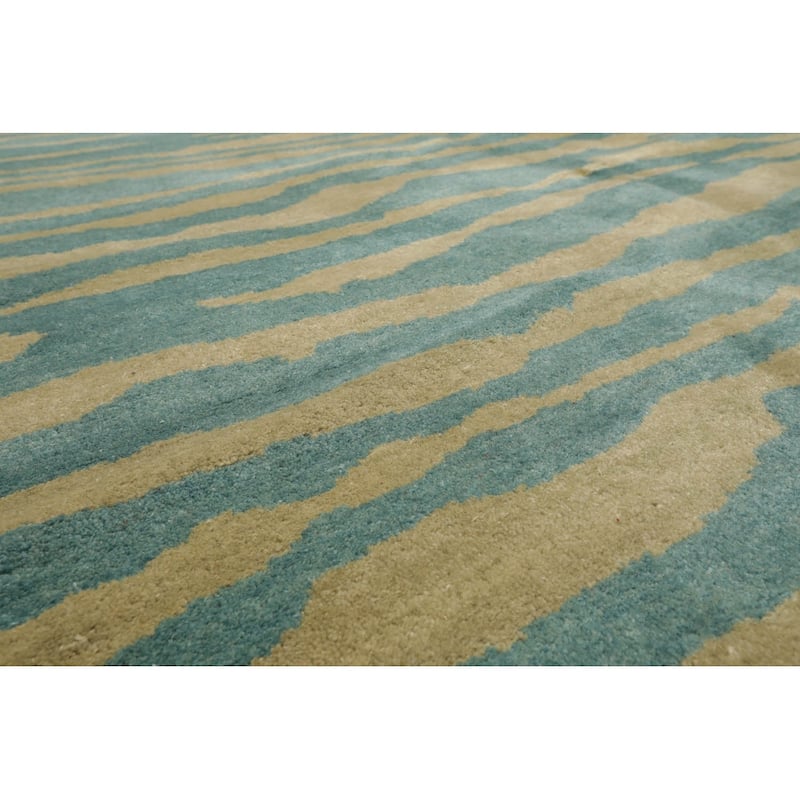 Hand Knotted Michaelian & Kohlberg Turquoise Tibetan Wool Area Rug - 5' x 8'