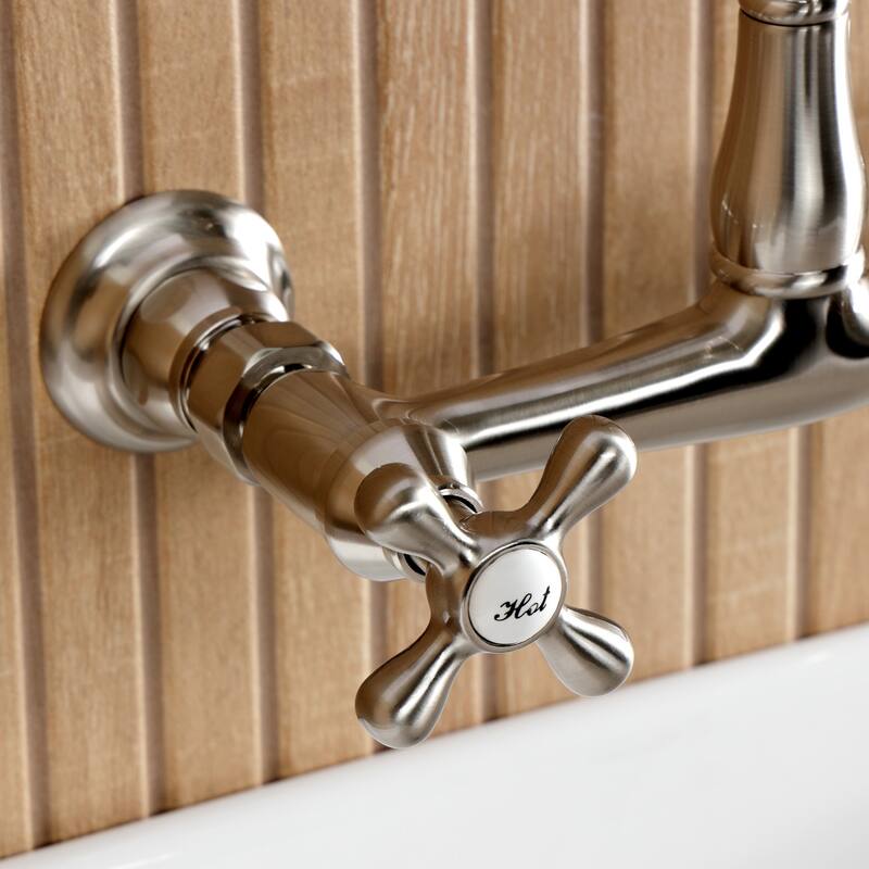 Kingston Brass English Country Two-Handle 2-Hole Wall Mount Bathroom Faucet
