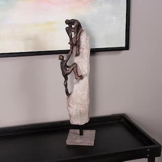 Allan Andrews People Climbing on Stone Decorative Statue